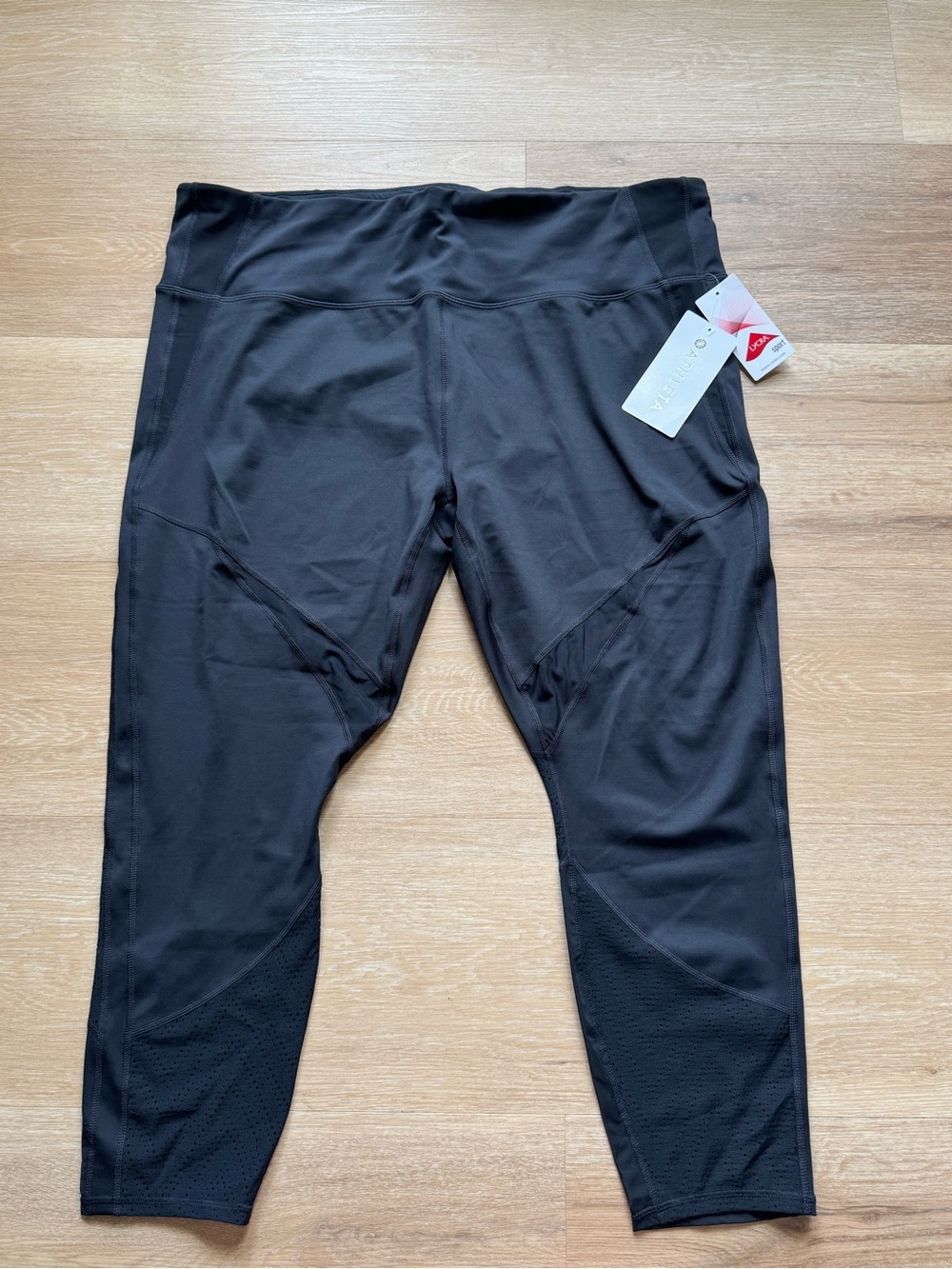 Athleta Black Capri Leggings with Laser-Cut Panels
